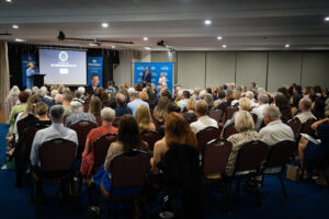 The community watching on at the 2024 Fisher Community Awards for the winner announcements